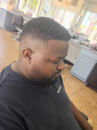 Erika Navarro (Barber/stylist)